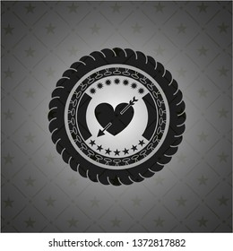 heart with arrow icon inside realistic dark emblem