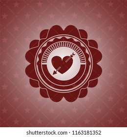 heart with arrow icon inside red emblem. Retro