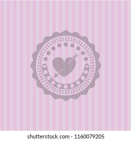 heart with arrow icon inside retro pink emblem