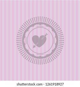 heart with arrow icon inside retro pink emblem