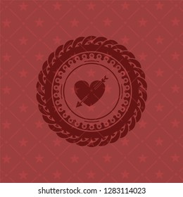 heart with arrow icon inside retro style red emblem
