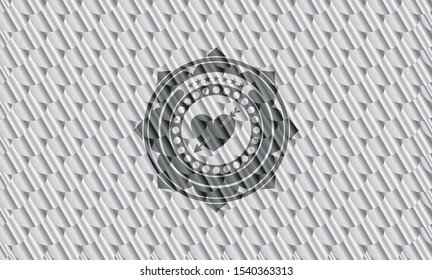 heart with arrow icon inside silver color emblem. Scales pattern. Vector Illustration. Detailed.