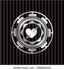 heart with arrow icon inside silvery shiny emblem