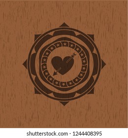 heart with arrow icon inside wooden signboards