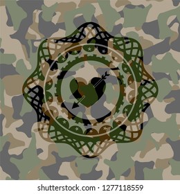 heart with arrow icon on camo pattern