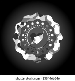 heart with arrow icon on grey camouflage pattern