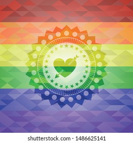 heart with arrow icon on mosaic background with the colors of the LGBT flag