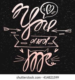 Heart with Arrow Saying 'You and Me' on a black grunge background.Cats inspired lettering.Design for textile tshirt print,flayer and poster.Perfect for valentines day,birthday,save the date invitation