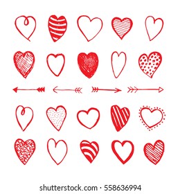 Heart and arrows icons hand drawn set in doodle style. Sketchy design elements for Valentine's day or wedding. Red love symbols isolated on white. Vector eps8 illustration.