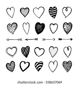 Heart and arrows icons hand drawn set in doodle style. Sketchy design elements for Valentine's day or wedding. Black love symbols isolated on white. Vector eps8 illustration.