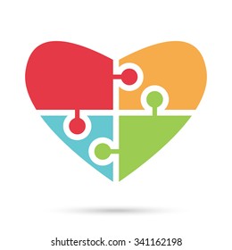 Heart assembled of four multicolor puzzle pieces isolated on white. EPS 10 vector illustration, transparency used