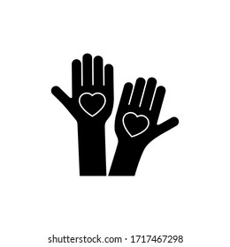 Heart black silhouette icon on the hand isolated on the white background. Voluntary symbol illustration. 