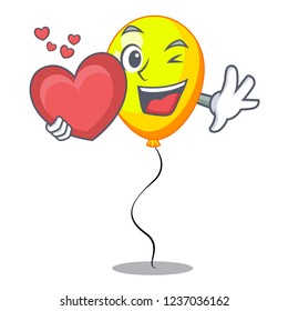 With heart character yellow balloon ticket on holiday