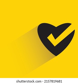 Heart And Check Mark Icon With Shadow On Yellow Background