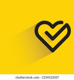 Heart And Check Mark Icon With Shadow On Yellow Background