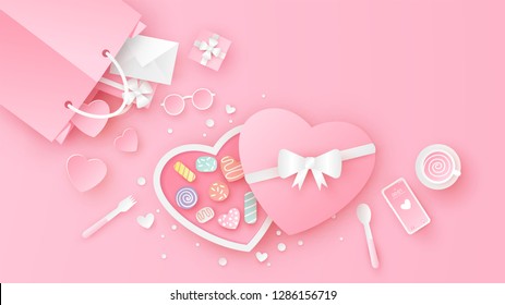 Heart chocolate box decorated in pink set on top view table with heart, gift box, envelope, coffee cup, shopping bag, glasses and smartphone. paper cut and craft style. vector, illustration.