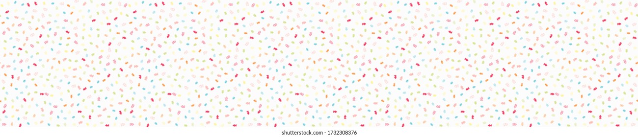 Heart confetti dotty paper texture seamless border background. Tiny colored flecked love hearts ribbon trim , Modern cute falling speckle pattern. Japanese kawaii wedding or valentine washi tape