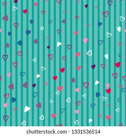Heart confetti seamless pattern on striped background