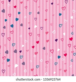 Heart confetti seamless pattern on striped background