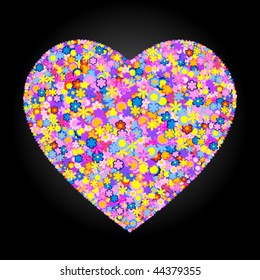 heart covered by different flower on black background