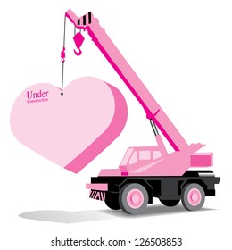 heart and crane under construction (love concept)