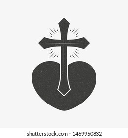 Heart cross with rays and grunge texture. Black and white illustration on a religious theme
