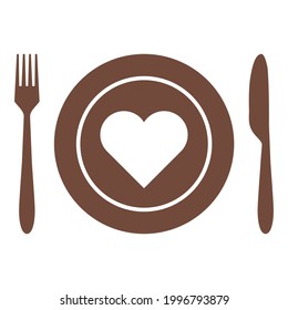 Heart and cutlery on white