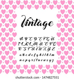 Heart decorated vintage frame with vector set of handwritten calligraphy alphabet script letters