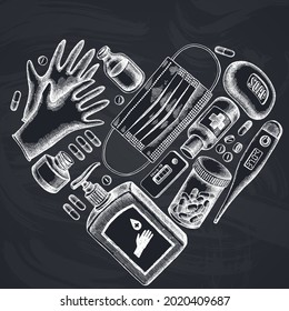 Heart design with chalk pills and medicines, medical face mask, sanitizer bottles, medical thermometer, coronavirus rapid test, soap, medical gloves