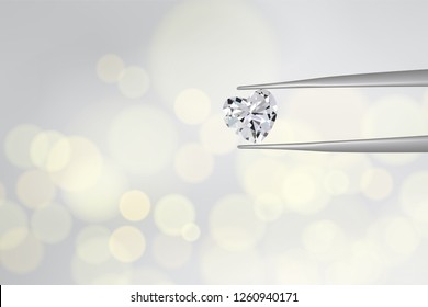 heart diamond hold by silver tweezer on gold blurry light background. Concept for dimond and gem selected for valentine special gift in vector illustration