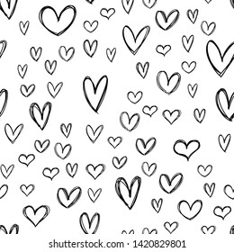 Heart doodles seamless pattern. Hand drawn background hearts texture.