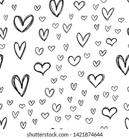 Heart doodles seamless pattern. Hand drawn background hearts texture.