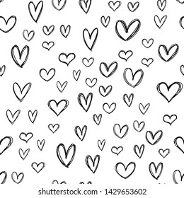 Heart doodles seamless pattern. Hand drawn background hearts texture.