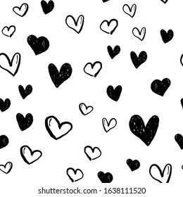 Heart doodles seamless pattern. Valentine's day texture design. Love background with hand drawn illustrated hearts.