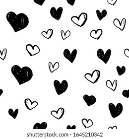 Heart doodles seamless pattern. Valentine's day texture design. Love background with hand drawn illustrated hearts.