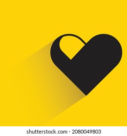 heart with drop shadow on yellow background