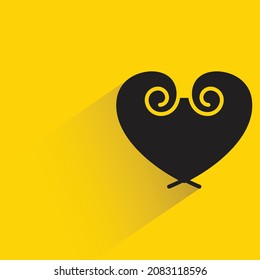 heart with drop shadow on yellow background