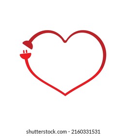 Heart with electrical plug. Medicine concept. St. Valentine's day concept.