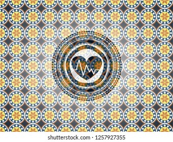 heart with electrocardiogram icon inside arabesque style emblem. arabic decoration.