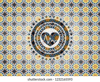 heart with electrocardiogram icon inside arabic style badge. Arabesque decoration.