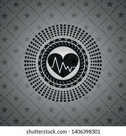 heart with electrocardiogram icon inside black badge