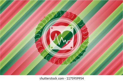 heart with electrocardiogram icon inside christmas badge.