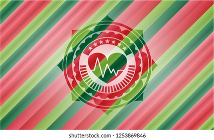heart with electrocardiogram icon inside christmas badge.
