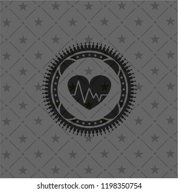 heart with electrocardiogram icon inside dark badge or emblem