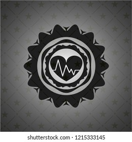 heart with electrocardiogram icon inside dark badge