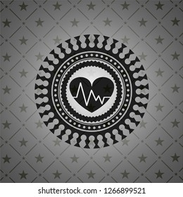 heart with electrocardiogram icon inside dark emblem