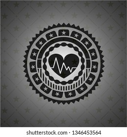 heart with electrocardiogram icon inside dark badge or emblem
