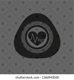 heart with electrocardiogram icon inside dark badge or emblem