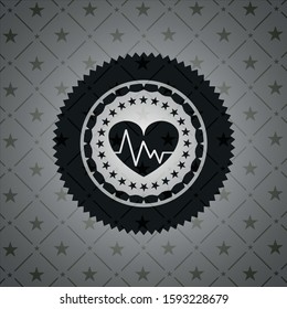 heart with electrocardiogram icon inside dark badge or emblem