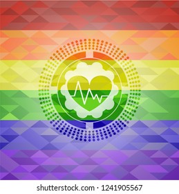 heart with electrocardiogram icon inside emblem on mosaic background with the colors of the LGBT flag